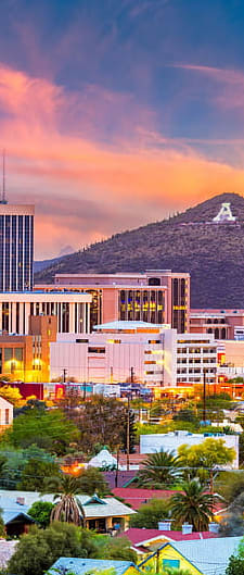 a view of the city of tucson at sunset at Presidio Palms Apartments, Arizona, 85701
