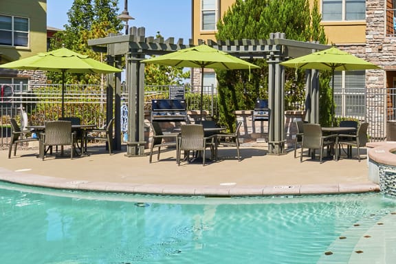 Acadia at Cornerstar outdoor patio with BBQ grill and dining tables