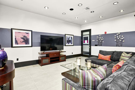 Acadia at Cornerstar resident lounge with multiple flat screen TVs
