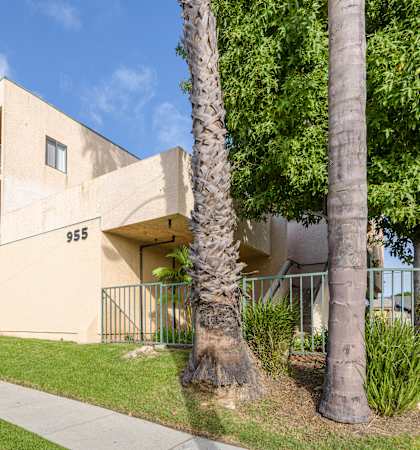 an apartment building with the address 385 on the side of the building