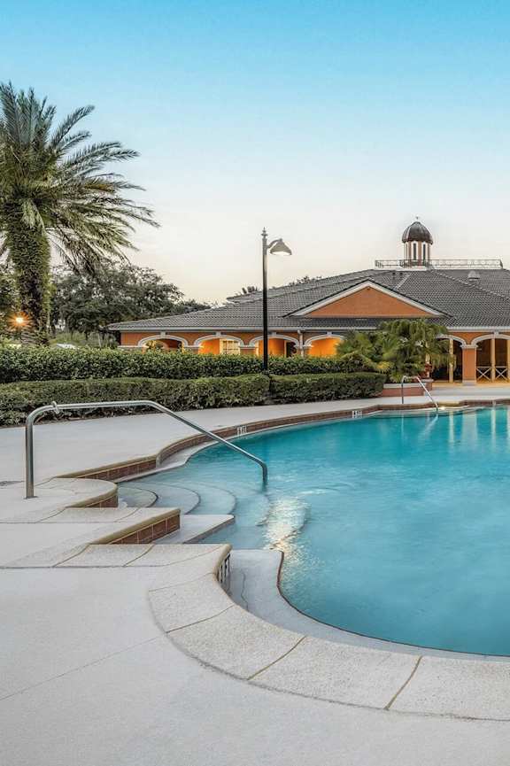 the swimming pool at the residence at dusk