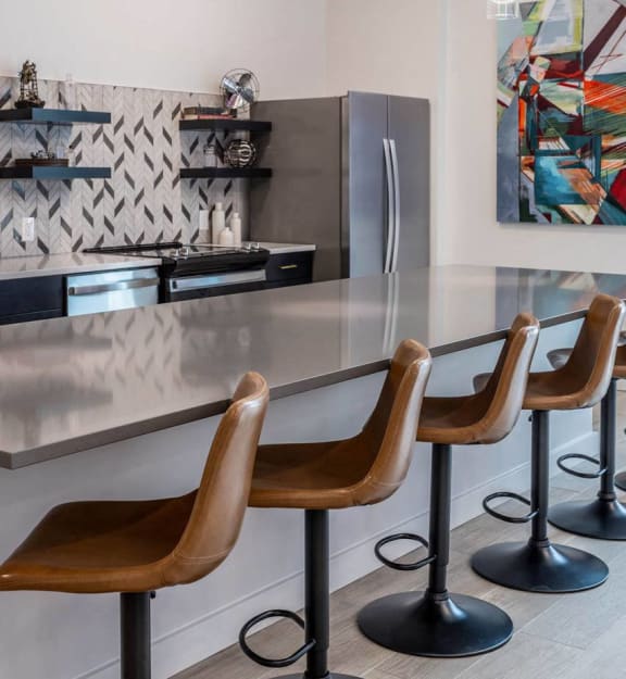 Kitchen With White Cabinetry And Appliances at Centro at Pine Nash, North Carolina
