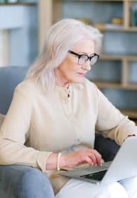 Woman at the library at The Riverview (55+), Sacramento California