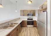 Thumbnail 6 of 32 - Home Kitchen at Red Rock Apartments, South Dakota