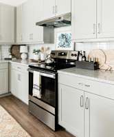 Kitchen with appliance at Villas of Mason Hills, Leander, Texas