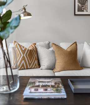 Inviting living room with comfortable seating representing the welcoming lifestyle at Willow Creek Apartments.