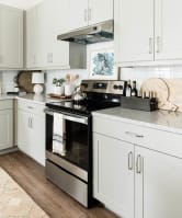 Kitchen with appliance at Villas of Mason Hills, Leander, Texas