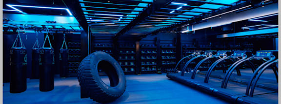 a large tire in the middle of a cyber room