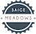 A logo with a gear design and the words "SAIGE MEADOWS" written across it.