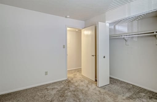 Bedroom with Spacious Closet at Thompson Village Apartments