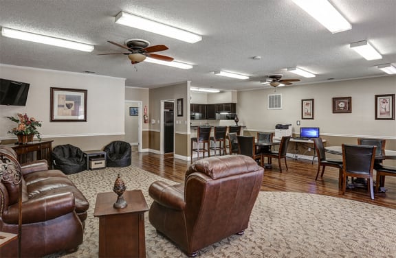 Clubhouse with seating, business center, and kitchen.