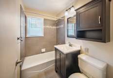 Bath tub and sink at Rivercrest Apartments, Piscataway  08854