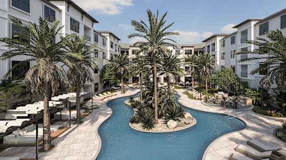 A pool surrounded by palm trees and white buildings.