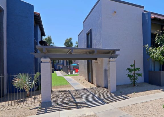 Wood-topped Pergola in front of  manicured grounds at Summers Point in Glendale, Arizona 85301