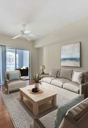 a living room with a couch and coffee table at Via Lugano, Boynton Beach, 33436