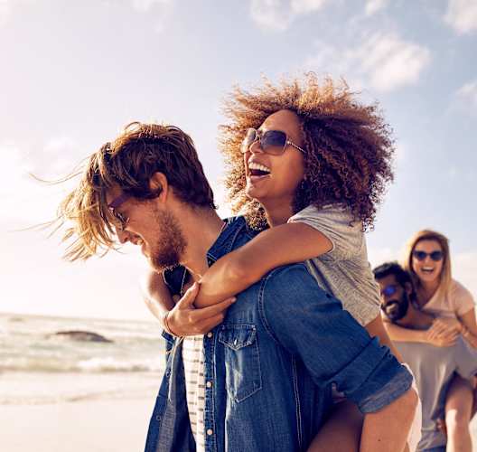 people enjoying life on the beach
