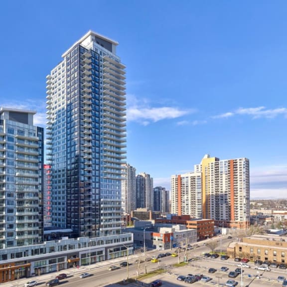 an aerial view of the city with skyscrapers at Versus, Calgary, AB