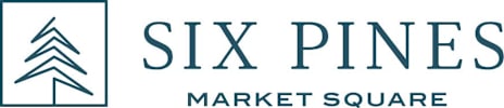 A logo with a pine tree and the words "Six Pines Market Square".