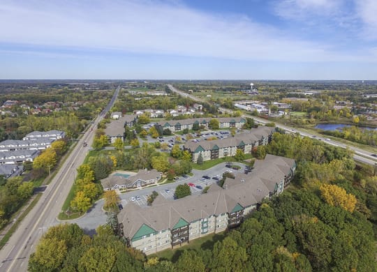 Ariel View of the White Bear Woods Apartment Community Nestled In Amongst the Trees