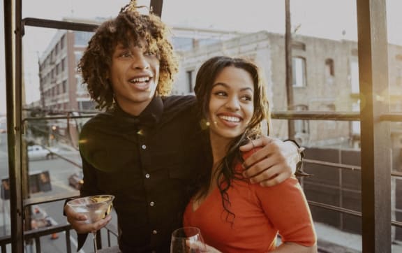 a man and a woman sitting at a bar with a drink at The Audubon New Haven, Connecticut, 06511