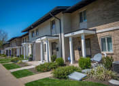 Thumbnail 20 of 41 - Crane Village Townhomes Building Exterior