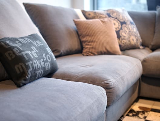 Grey Couch with Decorative Pillows
