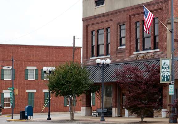 a building with a large neon sign on the front of it
