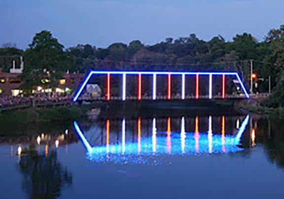 a building with a large neon sign on the front of it