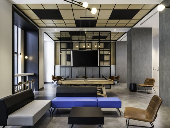 a room filled with furniture and a large window