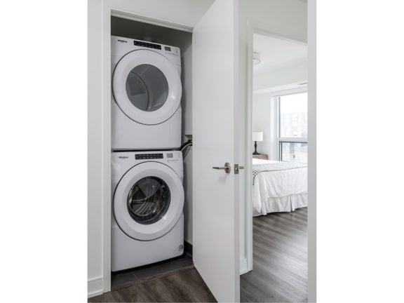 a white washer and dryer in a room