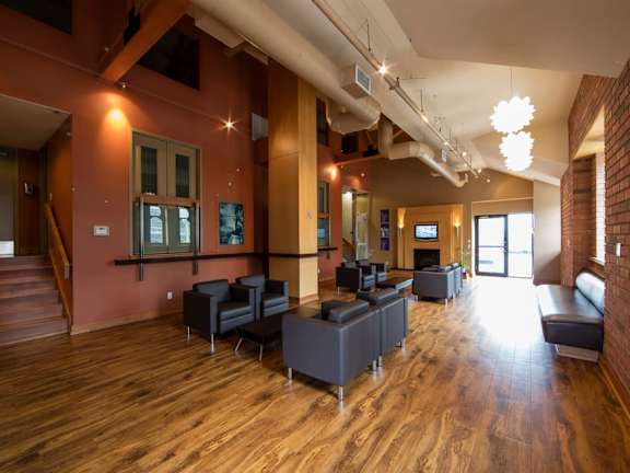 a large room with couches and chairs