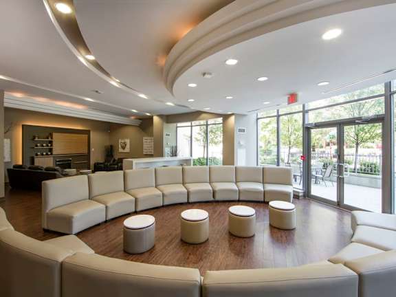 a large room with a couch and chairs