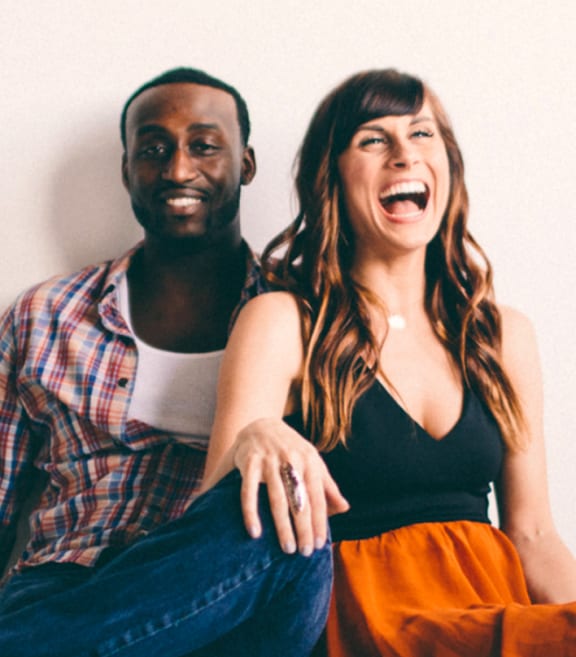 a man and a woman sitting on a couch