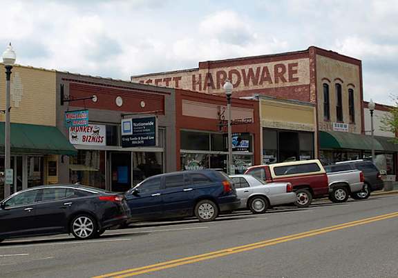 a building with a large neon sign on the front of it