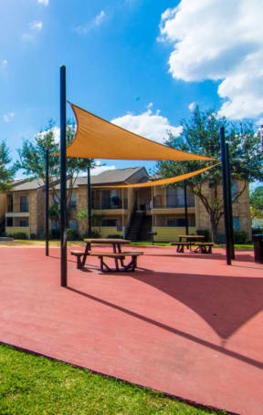 our apartments offer a park with a volleyball court