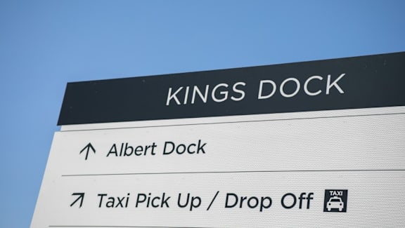 a sign for kings dock and a taxi pick up and drop off sign at The Keel Apartments, Liverpool, L3 4GE