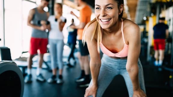 a group of people working out in a gym at Vox Apartments, Manchester, M15 4YD