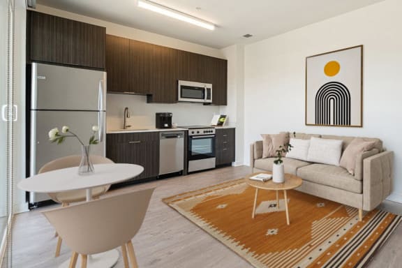 a small living room with a couch and a table