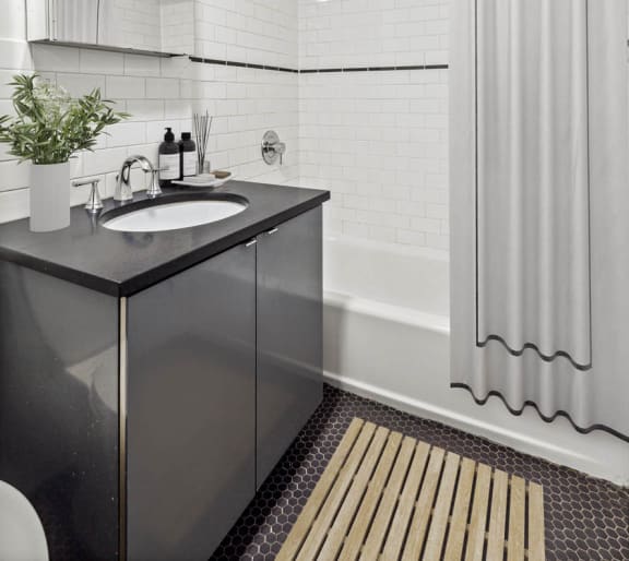 a bathroom with a sink and a bathtub