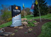 Thumbnail 1 of 41 - Crane Village Apartments Entry Signage