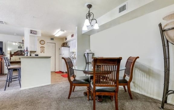 Model dining room with table and chairs