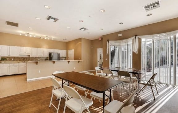 Clubhouse kitchen with tables and chairs