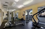Thumbnail 7 of 20 - Fitness center with mirrors and rowing machines