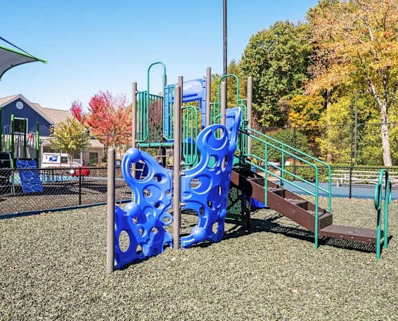 Playground with large sand-filled areas.