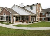 Thumbnail 3 of 41 - Beautifully Landscaped Grounds  With Walking Trails at Parkwood Highlands Apartments & Townhomes 55+, New Berlin, WI,53151