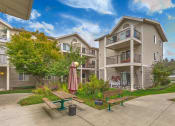 Thumbnail 2 of 19 - Exterior Building and Courtyard at VINTAGE AT BURIEN, Burien, WA