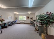 Thumbnail 7 of 19 - Room with tables and chairs at VINTAGE AT BURIEN, Washington