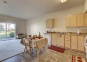Thumbnail 23 of 29 - kitchen, living, and dining at VINTAGE AT RICHLAND Apartments, Richland