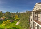 Thumbnail 12 of 16 - View of grass from balcony at VINTAGE AT Sequim Apartments, Washington