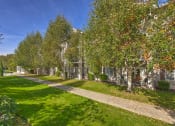 Thumbnail 16 of 16 - Pathway through apt buildings at VINTAGE AT Sequim Apartments, Sequim , WA 98382